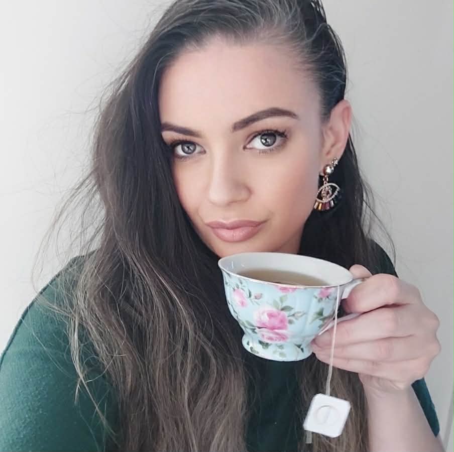 Candice with a floral teacup
